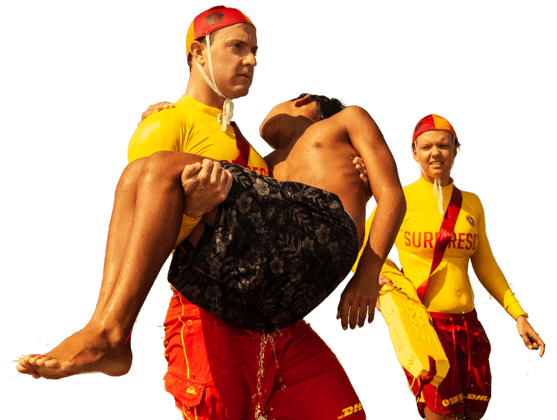 description of tLifesavers rescuing a boy from the surfhe image